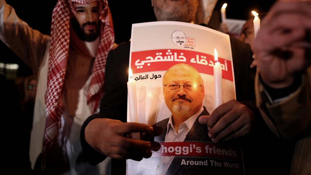 A protestor wears a mask of Saudi crown prince Mohammad Bin Salman with a red painted hands during the demonstration in front of Saudi Arabian consulate in Istanbul, Turkey, on October 25th. Photography: EPA