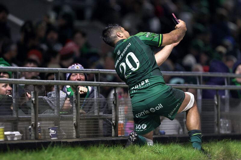 Connacht's Jarrad Butler takes a selfie with fans after the win over Ulster. Photograph: Laszlo Geczo/Inpho