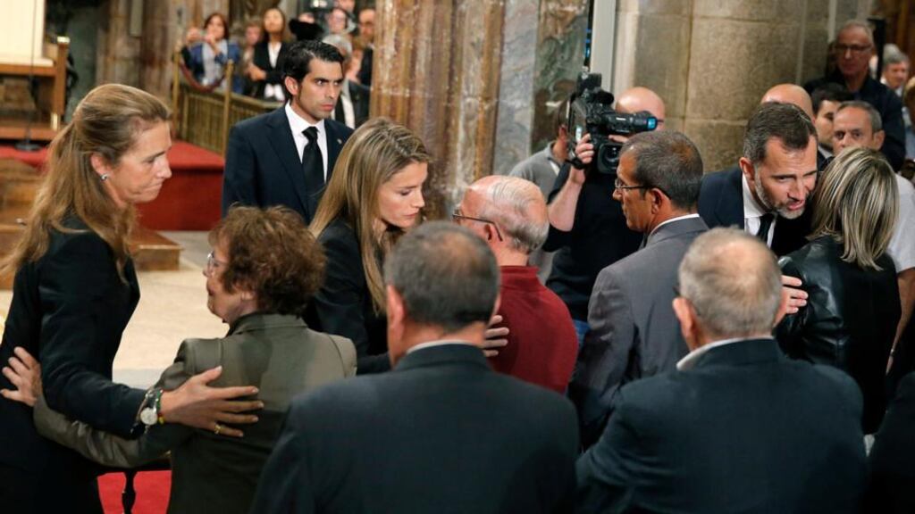 Spain’s Princess Elena (left), Princess Letizia (rear centre) and Prince Felipe (right) comfort relatives of the train crash victims at the end of a funeral mass at the cathedral in Santiago de Compostela, Spain, on July 29th. Photograph: AP