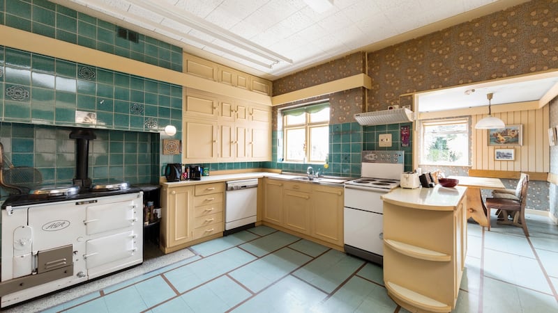 Kitchen opening into breakfast room