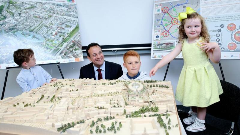 Minister for Health Leo Varadkar with  Olivia Evans (3), her brother Nathan (5), from Kilmainham, and Darragh Earry (12) from the National Youth Advisory Committee. Photograph: Maxwells