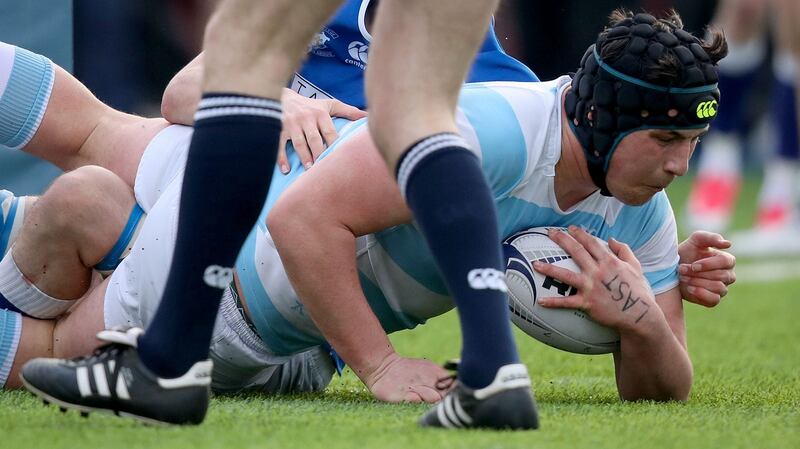 Thomas Clarkson scores one of Blackrock’s six tries. Photograph: Oisin Keniry/Inpho