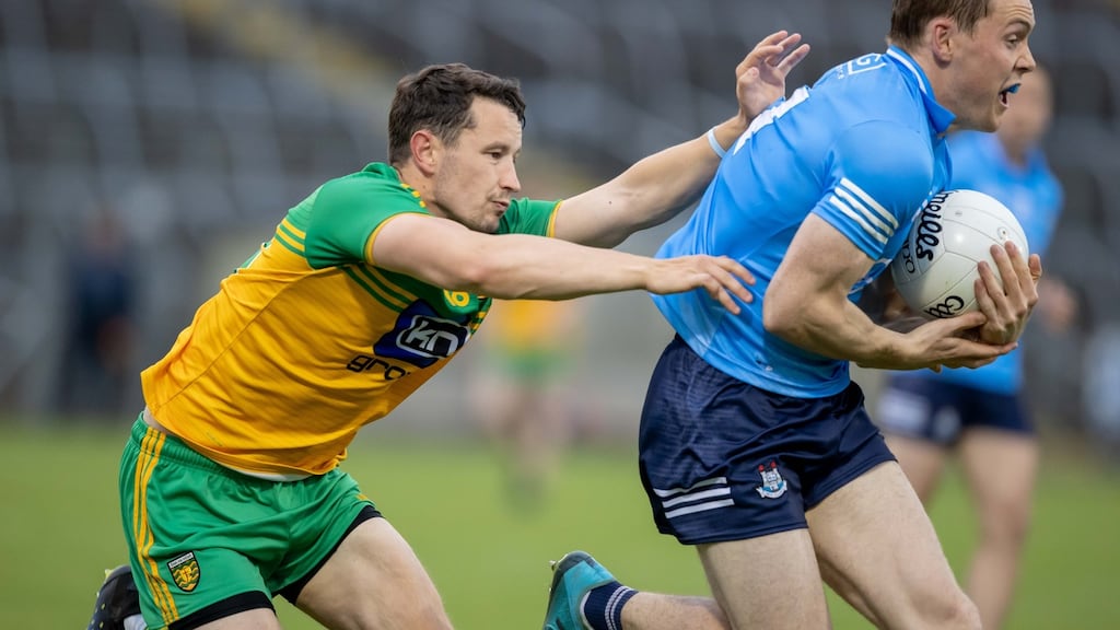 Donegal’s Hugh McFadden with Con O’Callaghan of Dublin in their Allianz Football League Division 1 semi-final at Kingspan Breffni Park, Cavan. Photograph: ©Inpho/Morgan Treacy