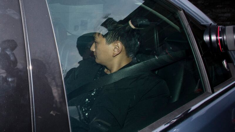 Chinese national Xing Wang arrives at Dublin District Court: he is charged with possessing a false Hong Kong passport, failing to present to an immigration officer on arrival into the State and failing to present a passport. Photograph: Collins Courts.