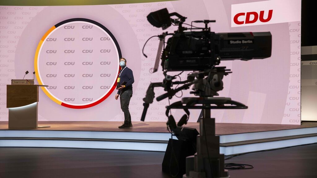 Preparations for the CDU’s digital conference in a hall at Berlin Messe fairgrounds. Photograph: Odd Andersen/Pool/AFP via Getty