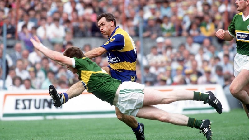 Clare’s Noel Roche gets a shot away during the 1992 Munster SFC Final against Kerry at the Gaelic Grounds in Limerick. Photograph: Inpho