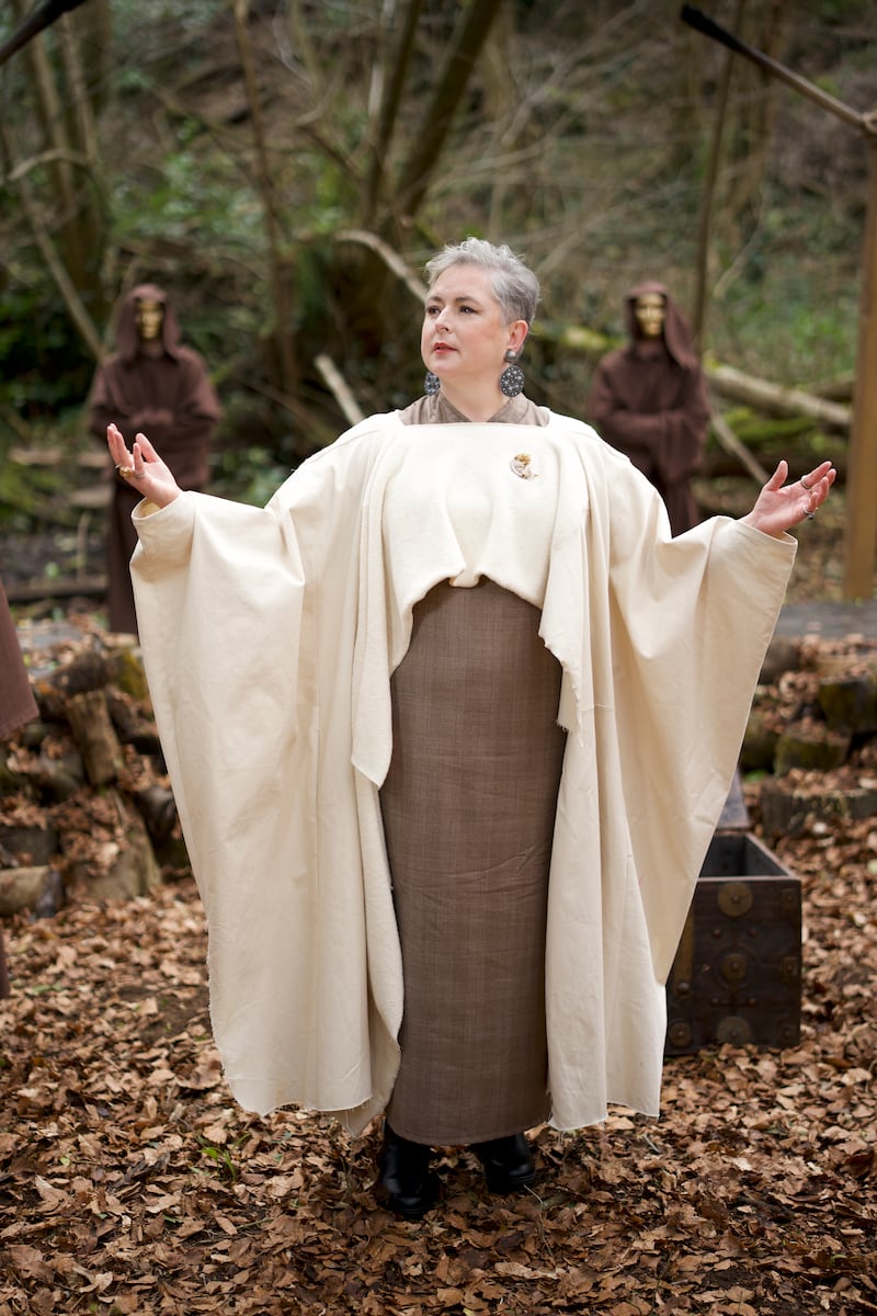 Cream cape Siobhan's own with a Pierre de Lune brooch from Delphi Antiques and a kimono dress upcycled bv ZeroWaster. Earrings Siobhan's own