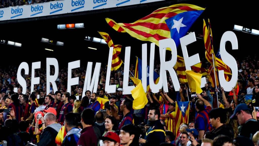 Pro-Independence supporters hold up letters that reads ‘We will be free’ during the La Liga match between FC Barcelona and Celta de Vigo at Camp Nou last weekend. Photograph: David Ramos/Getty Images