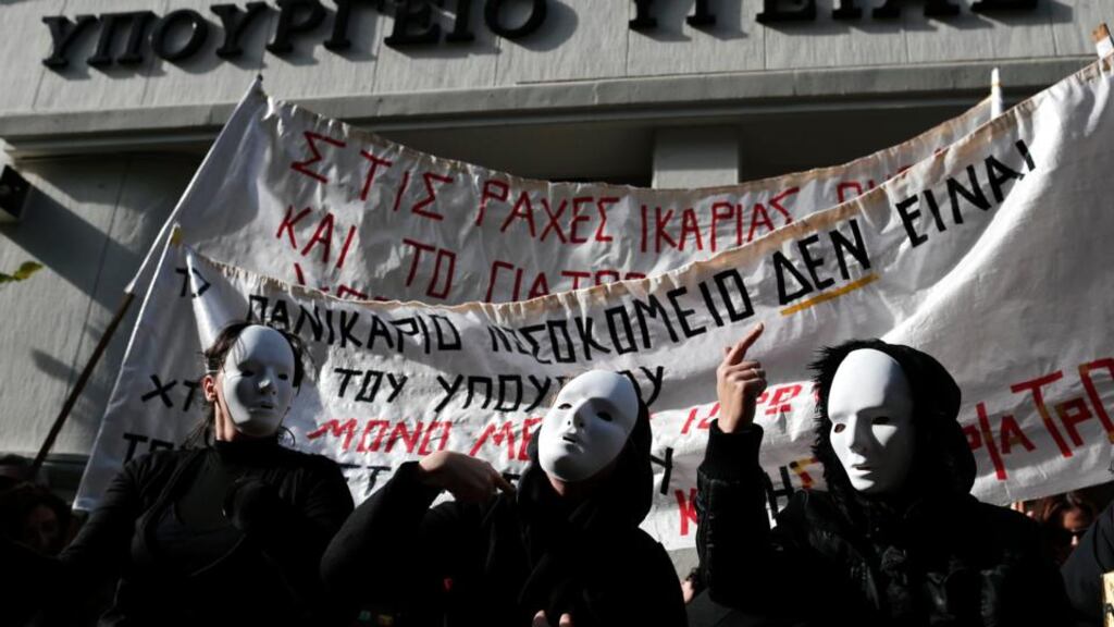 Protesters at a rally organised by unions from the state health sector against the government’s plans for cutbacks in medical staff and hospitals. Photograph: John Kolesidis/Reuters