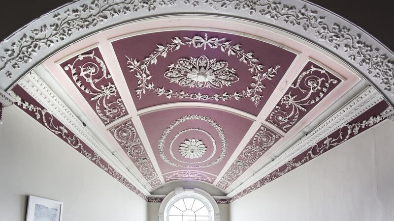 The strong use of contrasting colours helps to pick out the detail in the plasterwork throughout but it has been repainted many, many times and has lost some definition