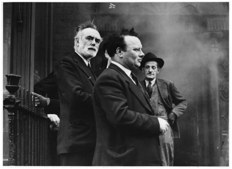 Martin Walton, left, during a fire at Walton's Musical Galleries.