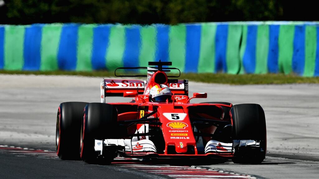 Sebastian Vettel’s Ferrari on track during qualifying for the Hungary Grand Prix at Hungaroring in Budapest. Photograph: Dan Mullan/Getty Images