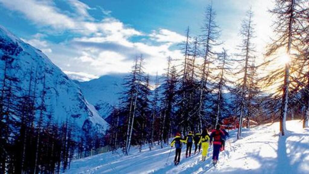 Into the wilderness: a group of skiers head out into the country photograph: GETTY IMAGES
