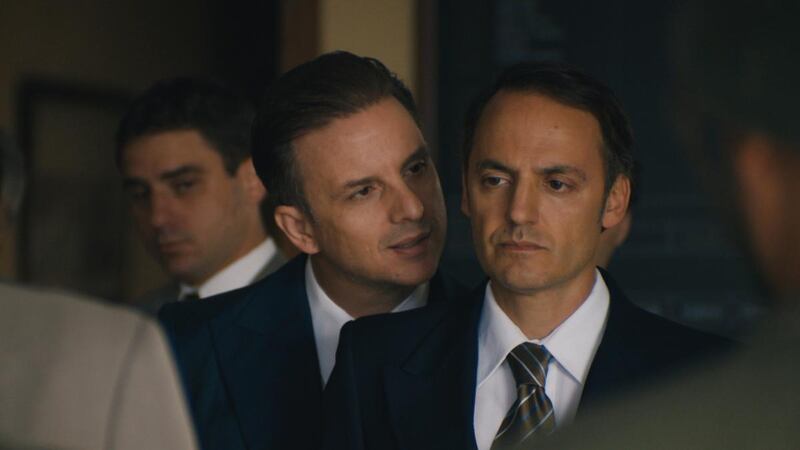 Elli Medeiros and Fabrizio Rongione in Azor