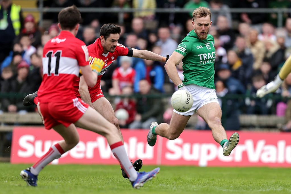 Fermanagh's Ultan Kelm gets the ball away despite the attentions of Derry's Christopher McKaigue in this year's Ulster SFC quarter-final. Photograph: Laszlo Geczo/Inpho