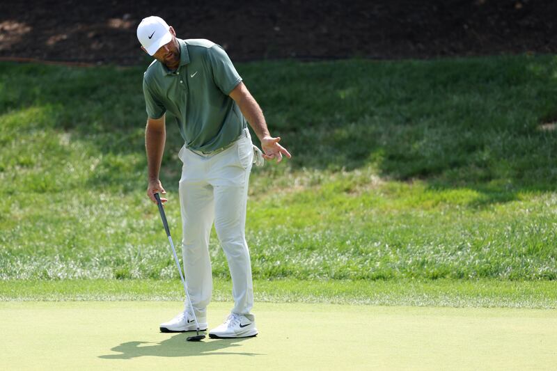 Scottie Scheffler reacts to his putt on the 8th green during the second round of the BMW Championship. Photograph: Kevin C Cox/Getty Images