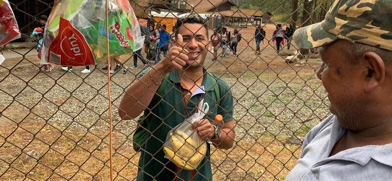 A man expresses his gratitude after receiving bananas which were passed through the fence surrounding the former army camp, and now a reception centre at Los Planes, Panama. Photograph: Peter Murtagh