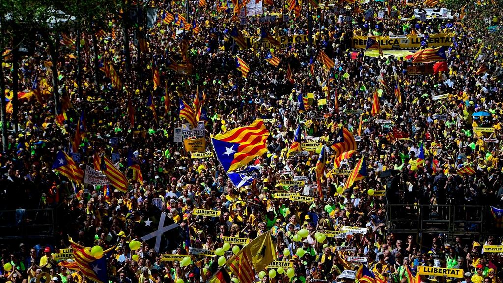 People march in Barcelona calling for the return of the 16 Catalan leaders who are in prison or have fled the country. Photograph: AFP