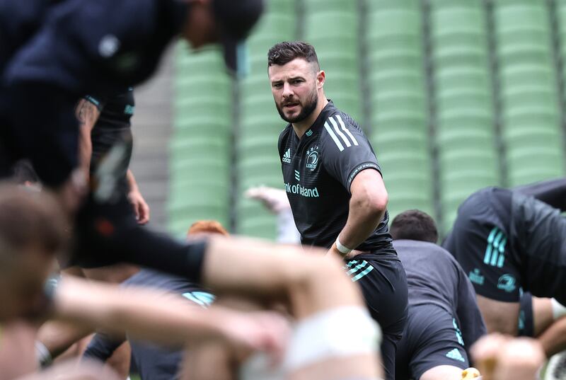 Leinster captain Robbie Henshaw limbers up during a training spin at the Aviva on Friday. Photograph: Bryan Keane/Inpho