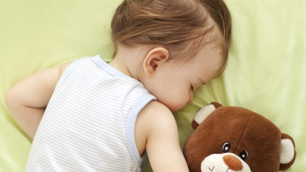 Make sure the last few steps of his bedtime routine take place in his cot, surrounded by lots of positive sleep associations such as a teddy bear or a comfy blanket. Photograph: Thinkstock