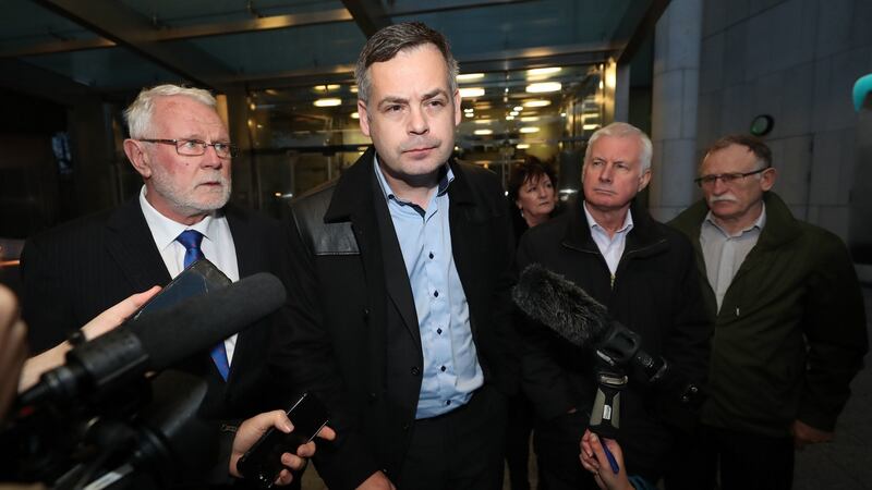 Sinn Féin TDs (left to right) Martin Ferris, Pearse Doherty, Sean Crowe and Dessie Ellis outside the court. Photograph: Niall Carson/PA Wire.