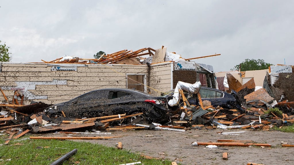 A home had its roof torn off after a tornado ripped through Monroe, Louisiana. Photograph: Nicolas Galindo/The News-Star/AP.