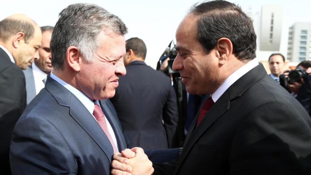 Egyptian president Abdel Fattah al-Sisi (R) greeting Jordanian King Abdullah II (L) in Cairo, Egypt on Thursday. Photograph: EPA/Egyptian presidency handout.