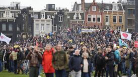 Dutch riot police disperse thousands protesting against lockdown measures