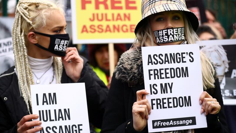 Supporters of WikiLeaks founder Julian Assange  outside Woolwich crown court in London ahead of the opening of his extradition hearing on Monday. Photograph: Hannah Mckay/Reuters