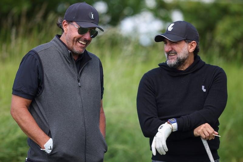 Phil Mickelson and Yasir Al-Rumayyan. Photograph: Charlie Crowhurst/LIV Golf/Getty