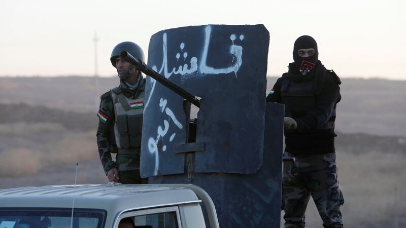 Peshmerga forces advance in the east of Mosul to attack Islamic State militants in Mosul, Iraq on Monday. Photograph: Azad Lashkari/Reuters