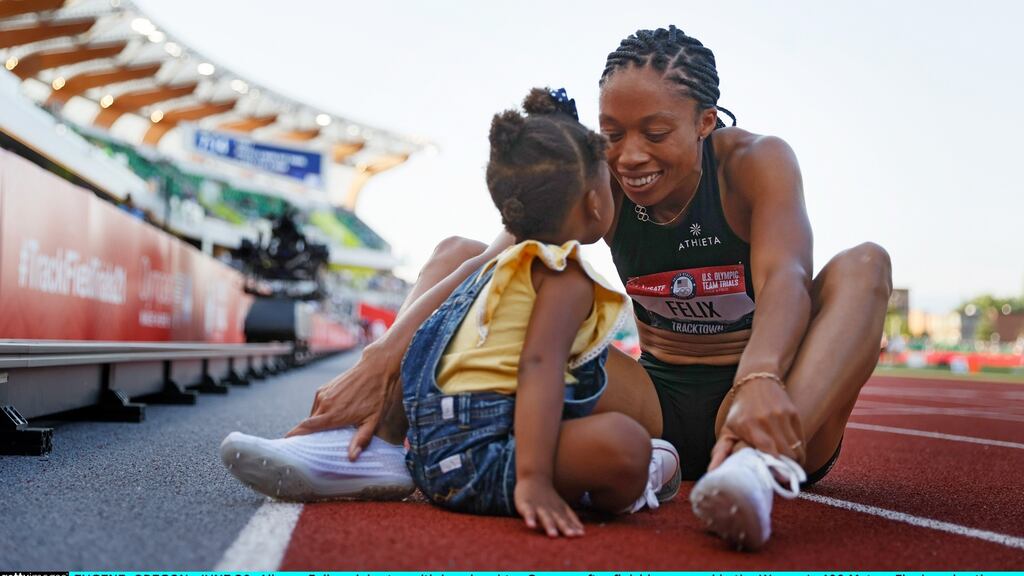 Allyson Felix celebrates with her daughter Camryn after finishing second in the Women’s 400m final at the US Olympic track and field trials. Photograph: Steph Chambers/Getty Images