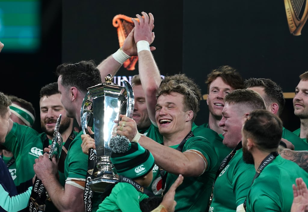 Ireland's Josh van der Flier celebrates with the Guinness Six Nations trophy and team-mates. Photograph: Brian Lawless/PA Wire