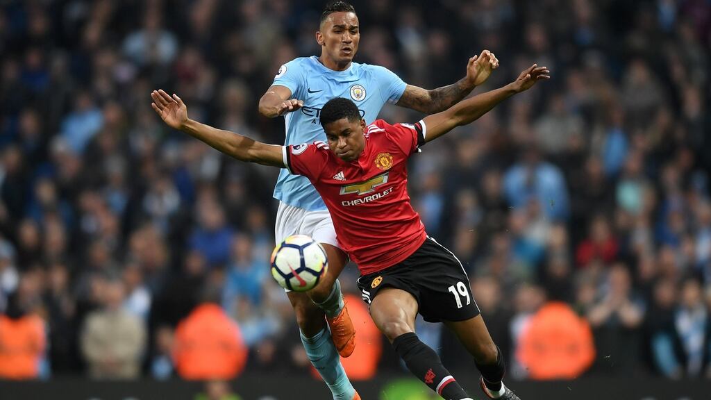 Marcus Rashford of Manchester United is challenged by Danilo of Manchester City at Etihad Stadium on Saturday. Photograph: Michael Regan/Getty Images
