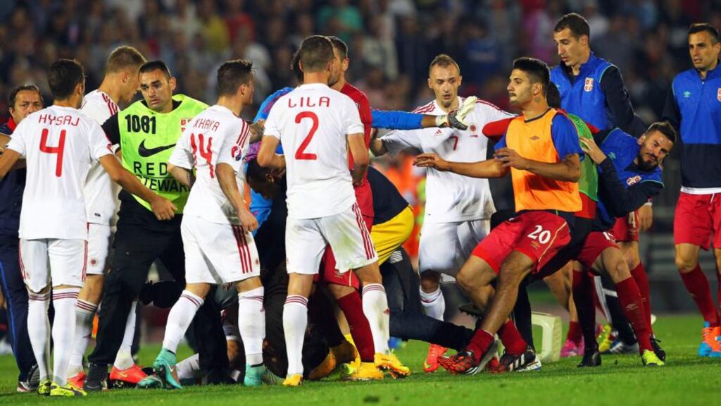 Serbian and Albanian players clash during the Euro 2016 Group I qualifying match in Belgrade. Photograph: Koca Sulejmanovic/EPA