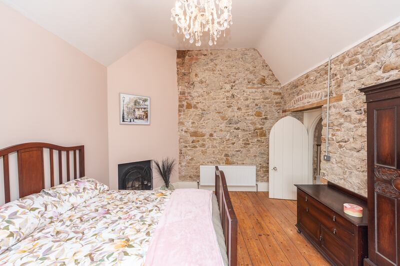 Some of the bedrooms have exposed stone walls