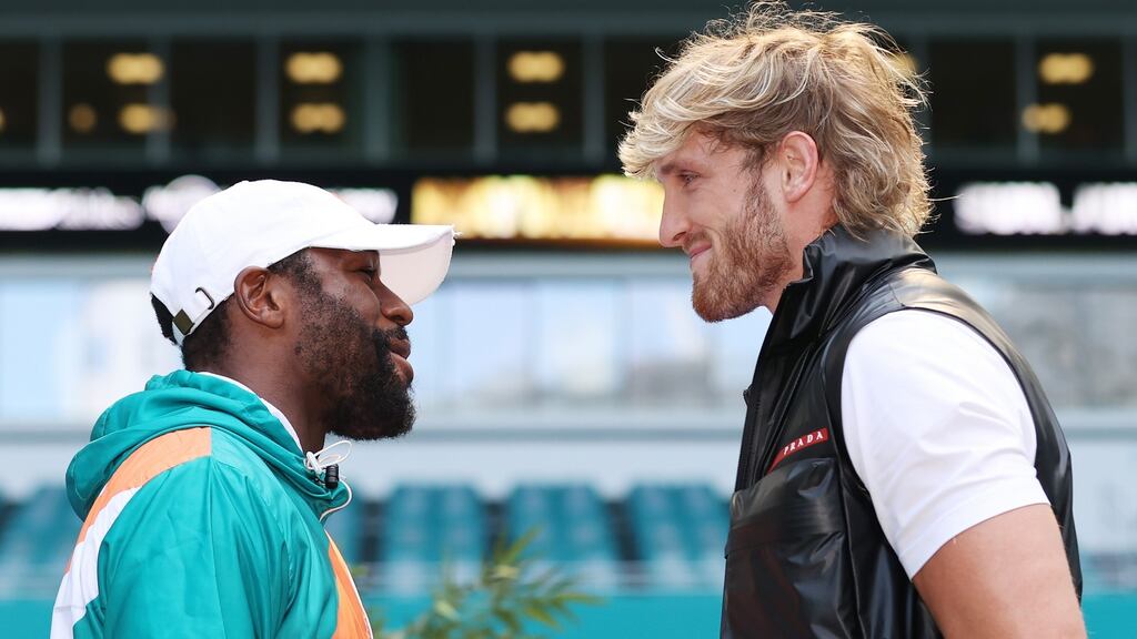 Floyd Mayweather and Logan Paul face off during a press conference to announce their June 6th fight at Hard Rock Stadium in Miami Gardens, Florida. Photograph: Cliff Hawkins/Getty Images