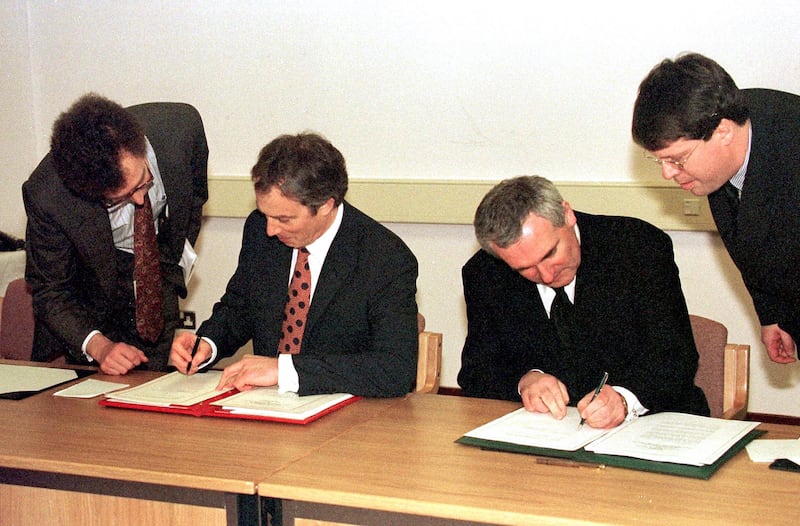 Then British prime minister Tony Blair and then taoiseach Bertie Ahern signing the Belfast Agreement 25 years ago. Photograph: PA