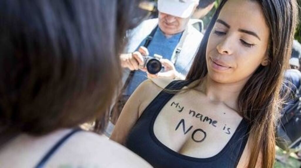 A woman protester against sexual violence. Some 11 per cent of Irish of EU respondents to a Eurobarometer survey thought being drunk or having used drugs justified sexual intercourse without consent. File photograph: Getty Images