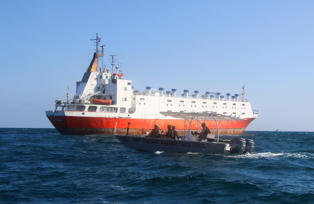 Police in a patrol boat from the northeastern Somali state of Puntland protect a ship last week following an increase in piracy attacks in the area. Photograph: Abuukar Mohamed Muhidin/Anadolu via Getty Images