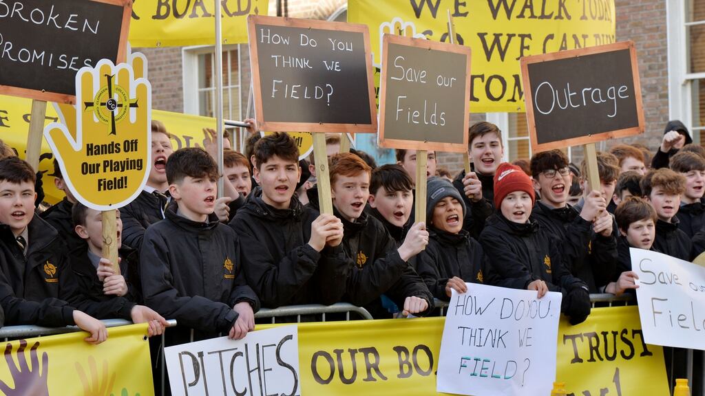 Students at Clonkeen College protesting at the Dáil on Wednesday over the proposed sale of the school’s sports pitches to developers. Photograph: Alan Betson