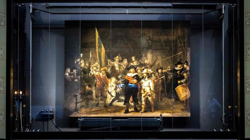 The Night Watch remounted at the Rijksmuseum. Photograph: Remko De Waal/ANP/AFP via Getty Images