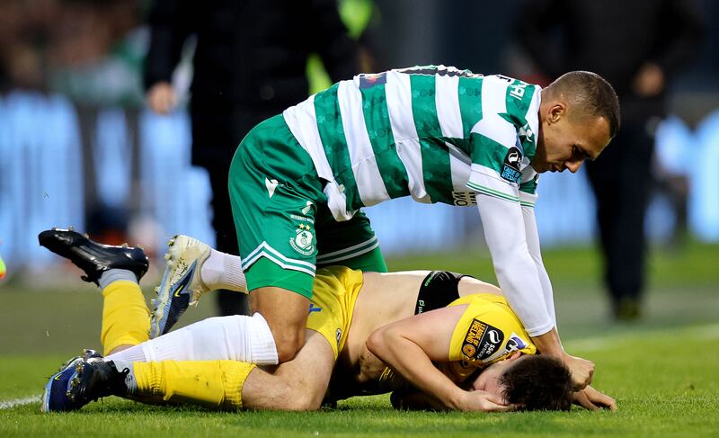 Shamrock Rovers’ Graham Burke clashes with Joe Adams of Kerry during the FAI Cup semi-final at Tallaght Stadium. Photograph: Ryan Byrne/Inpho