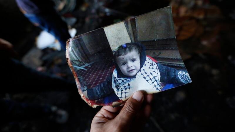 A photograph of 18-month-old Ali Dawabsheh who died in the attack. Photograph: EPA/Alaa Badarneh