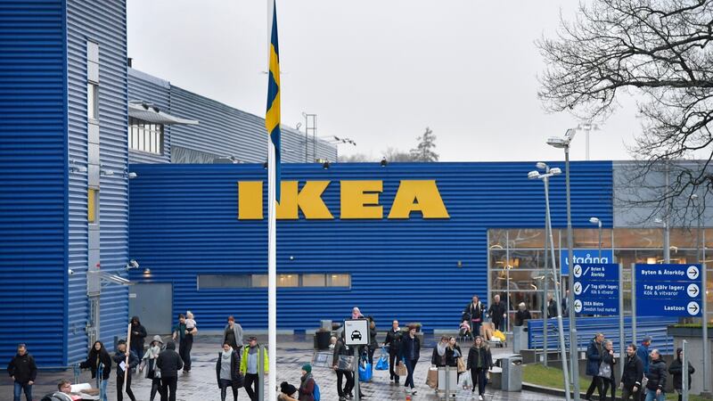 A Swedish flag flies at half mast outside an Ikea store in Stockholm, Sweden, today, after the death of store founder Ingvar Kamprad. Anders Wiklund/EPA
