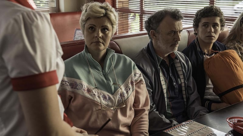 Tara Lynne O’Neill as Mary Quinn, Tommy Tiernan as Gerry Quinn and Dylan Llewellyn as James Maguire in Derry Girls.