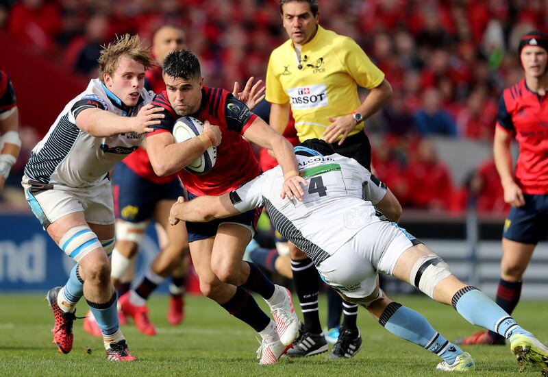 Munster's Conor Murray takes on Jonny Gray and Tim Swinson of Glasgow during the Champions Cup clash at Thomond Park in 2016. Photograph: Dan Sheridan/Inpho