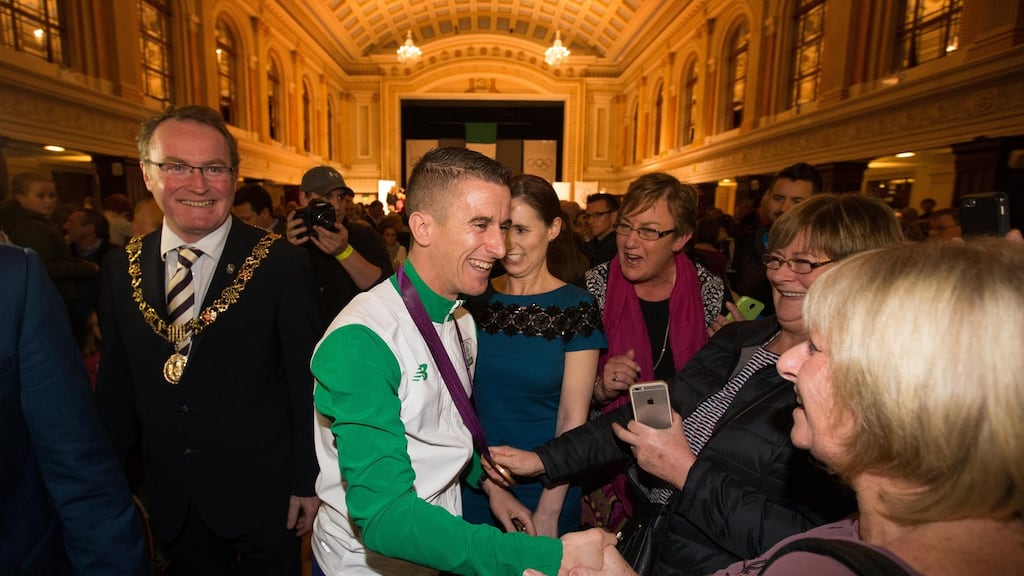 Rob Heffernan is presented with the 2012 London Olympic Men’s 50km Race Walk bronze medal at City Hall in Cork Photograph: Cathal Noonan/Inpho