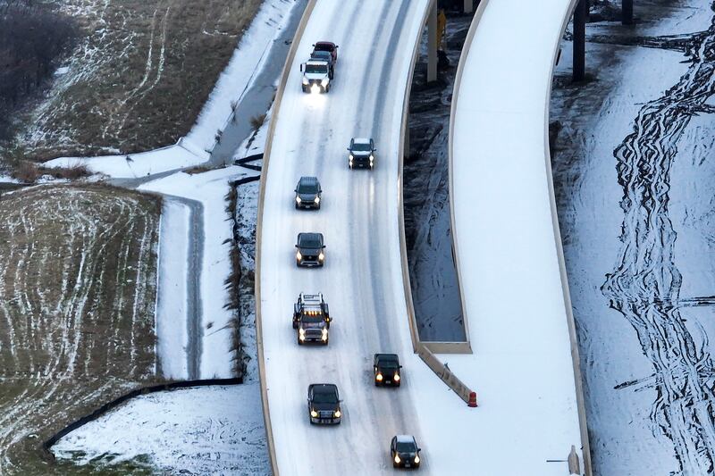 An icy mix covers Highway 114 on Monday in Roanoke, Texas. Photograph: Lola Gomez/The Dallas Morning News via AP