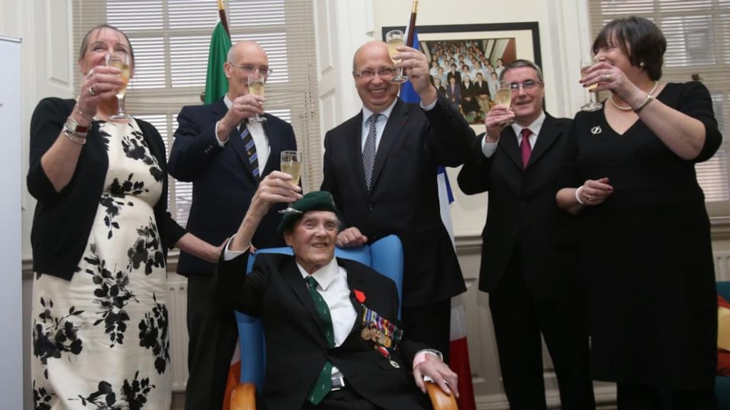 Pat Gillen, with his children – (left to right) Mary, Robin, Gerard and Patrica – receives the Legion d’Honneur from French Ambassador Jean-Pierre Thebault (centre) at the Mercy Hospital in Cork. Photograph: Niall Carson/PA